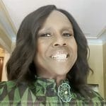 Deborah Roberts’s green geometric print blouse on Today