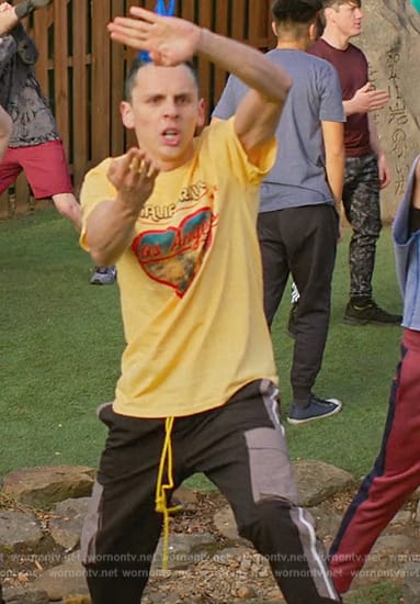 Eli’s yellow Los Angels graphic tee on Cobra Kai