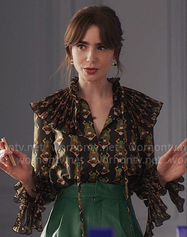 Emily’s beetle print blouse and green leather shorts on Emily in Paris