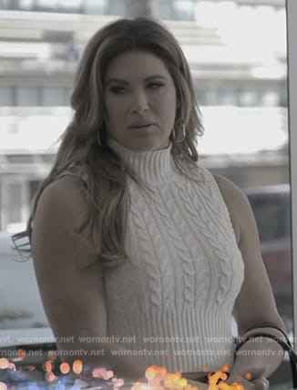 Emily’s white cable knit vest on The Real Housewives of Orange County