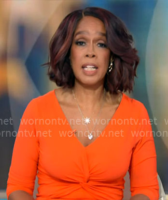 Gayle King’s orange twist front dress on CBS Mornings