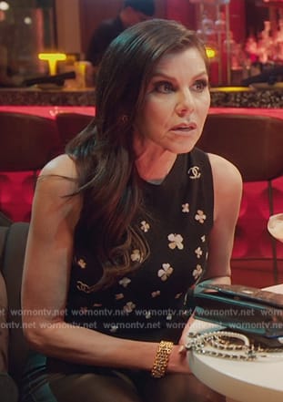 Heather’s black floral knit vest on The Real Housewives of Orange County