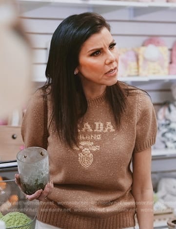 Heather’s Prada logo short sleeve sweater on The Real Housewives of Orange County