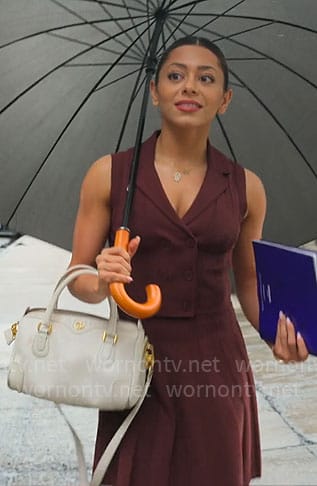 Jade’s burgundy vest and skirt set on Owning Manhattan