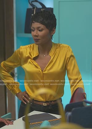 Jax’s yellow silk blouse on Reasonable Doubt
