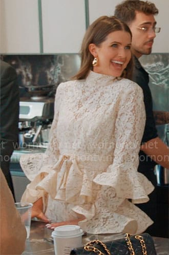 Jess’s cream lace dress with ruffles on Owning Manhattan