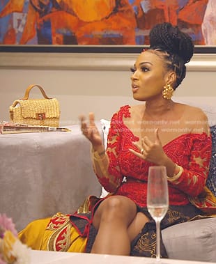 Lesa’s handbag and gold earrings on The Real Housewives of Dubai