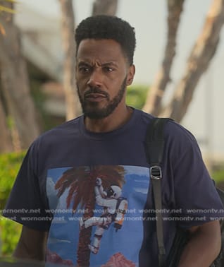 Lewis’s navy Astronaut print tee on Reasonable Doubt