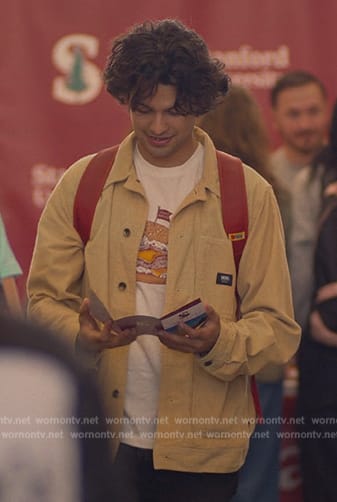 Miguel’s beige jacket and hamburger print tee on Cobra Kai