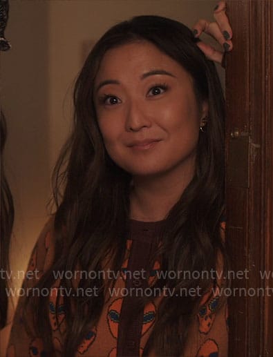 Mindy’s alien print cardigan on Emily in Paris