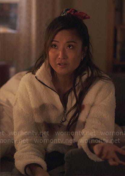 Mindy’s graphic print fleece sweatshirt on Emily in Paris