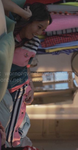 Mindy’s mixed stripe t-shirt and pants set on Emily in Paris
