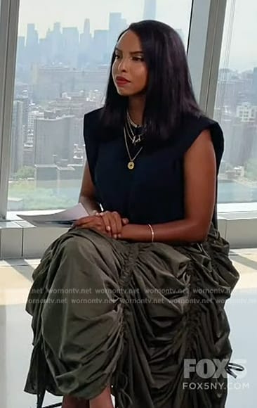 Mona’s green ruched skirt on Extra