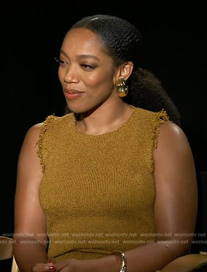 Naomi Ackie’s mustard frayed sleeveless dress on Access Hollywood