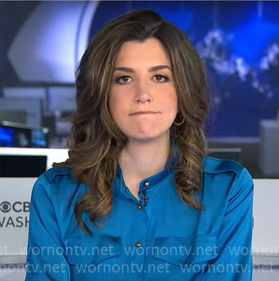 Nicole Sganga’s blue satin shirt on CBS Mornings