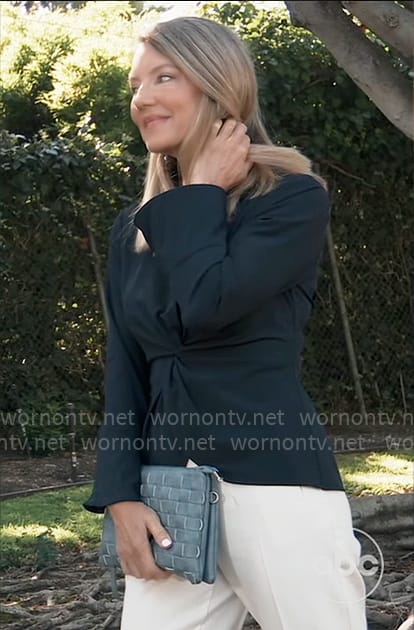 Nina’s navy twist front top on General Hospital
