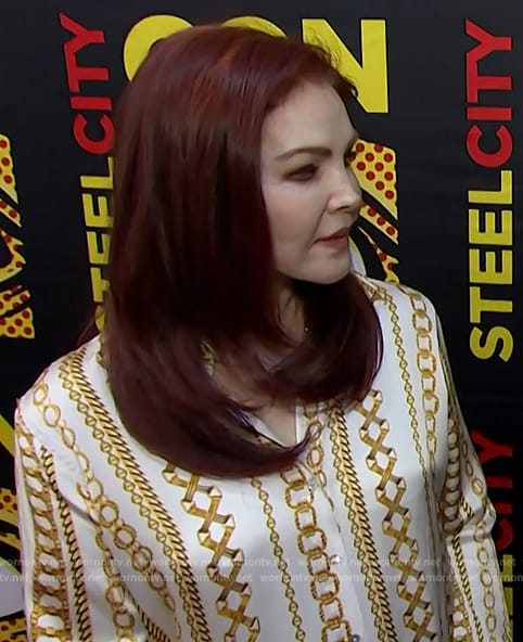 Priscilla Presley’s chain print blouse on E! News