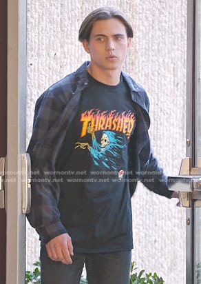 Robby’s black Thrasher print tee on Cobra Kai