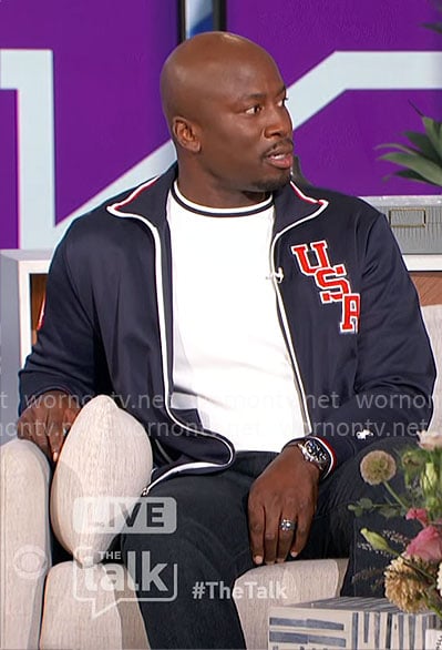 Akbar’s navy USA track jacket on The Talk