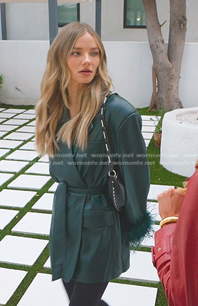 Alanna’s green leather jacket and shoulder bag on Selling Sunset