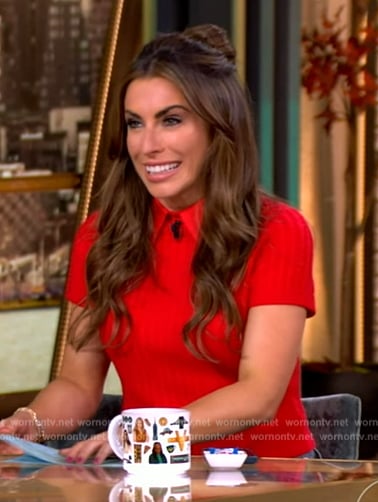 Alyssa’s red cable knit top and jeans on The View