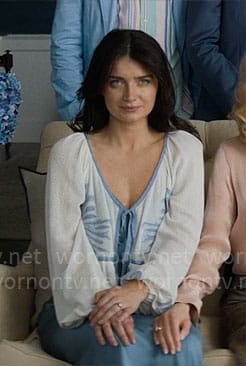 Amelia’s white and blue tie front top on The Perfect Couple