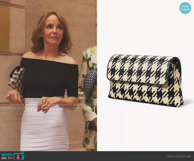 Aspinal of London Oversized Evening Clutch in Black & Ivory Woven Leather worn by Sylvie (Philippine Leroy-Beaulieu) on Emily in Paris
