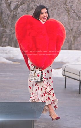 Bronwyn’s white lip print dress and heart jacket coat on The Real Housewives of Salt Lake City