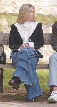 Camille’s white rosette shirt and black colorblock blazer on Emily in Paris