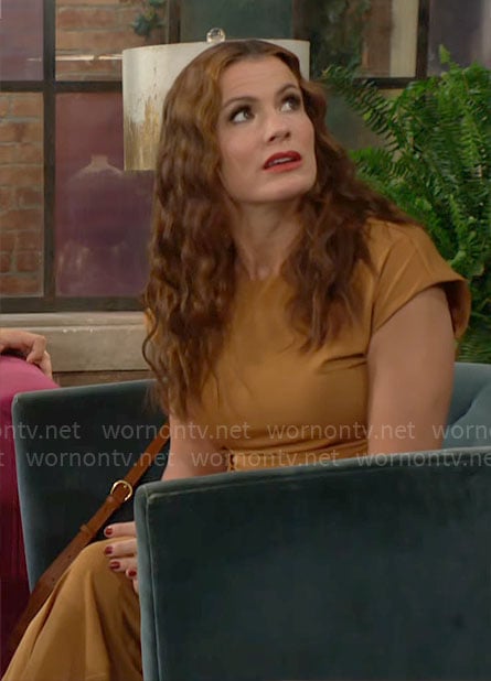 Chelsea’s orange midi dress on The Young and the Restless