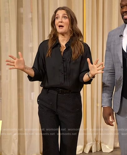 Drew’s black pleated blouse and sequin pants on The Drew Barrymore Show