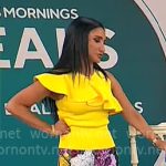 Elizabeth Werner’s yellow ruffle top and floral pants on CBS Mornings
