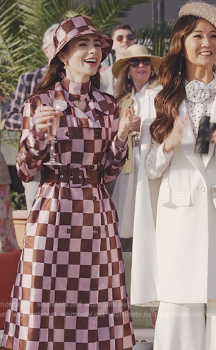 Emily’s pink check trench coat and top on Emily in Paris