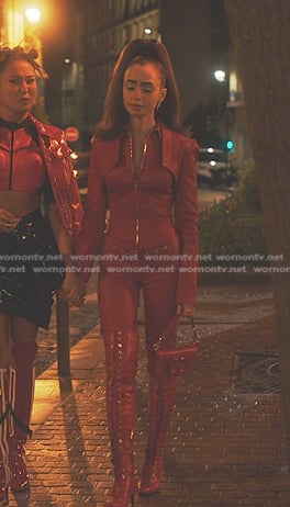 Emily’s red jumpsuit and over the knee boots on Emily in Paris