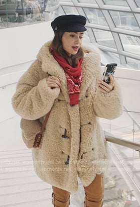 Emily’s beige fur coat on Emily in Paris