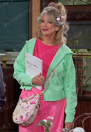Hattie’s green cropped zip hoodie and floral bag on Days of our Lives