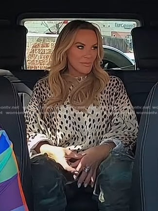 Heather’s beige cheetah print sweater on The Real Housewives of Salt Lake City