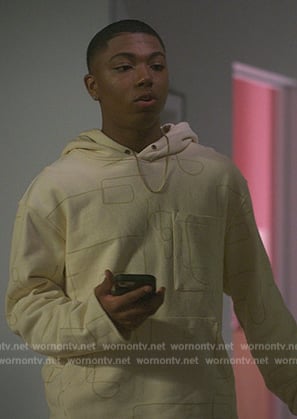 Spenser’s yellow printed hoodie on Reasonable Doubt