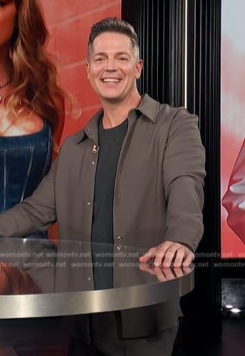 Jason’s brown stud button jacket on E! News