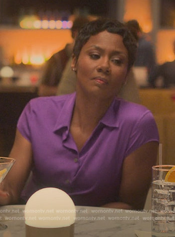 Jax’s purple short sleeve top on Reasonable Doubt