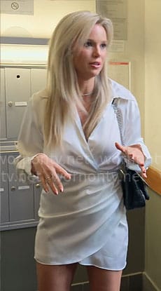 Jess T’s white wrap shirtdrss on Owning Manhattan