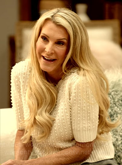 Joan’s pearl embellished sweater on The Golden Bachelorette