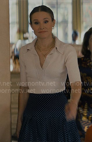 Joanne’s knit polo top and polka dot pleated skirt on Nobody Wants This