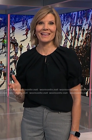 Kate’s black short sleeve pleated top on NBC News Daily