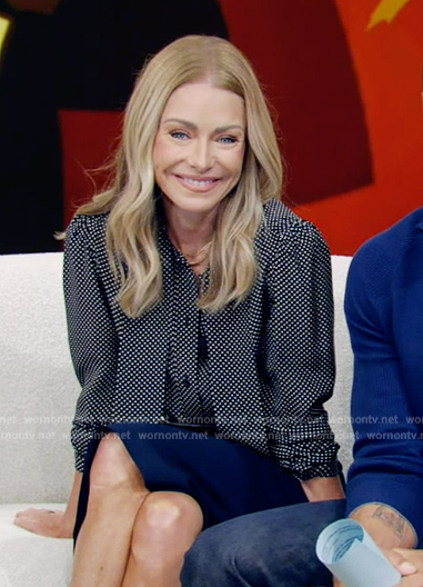 Kelly’s black polka dot print tie neck blouse on Live with Kelly and Mark