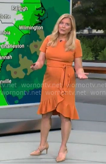 Kelly Cass’ orange ruffle hem dress on CBS Mornings