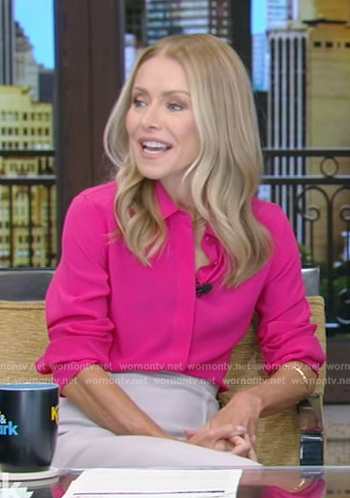 Kelly’s pink blouse and skirt on Live with Kelly and Mark