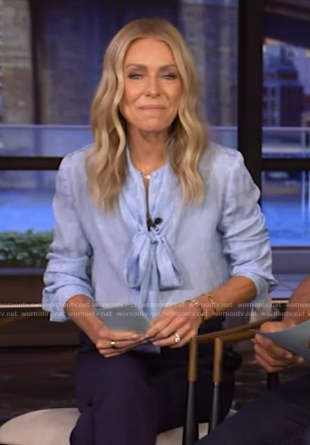 Kelly’s blue tie neck blouse on Live with Kelly and Mark