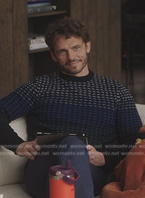 Laurent’s blue geometric print sweater on Emily in Paris
