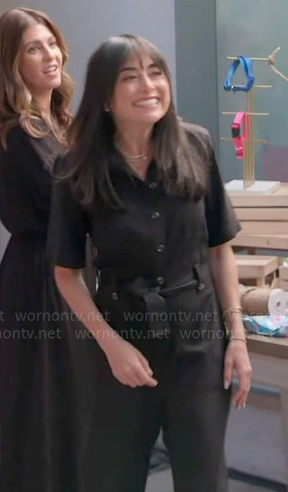 Lisa’s black short sleeved jumpsuti on Celebrations with Lacey Chabert